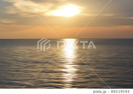 Sunset over the ocean. Blurry abstract art background in digital motion effect. 89319593