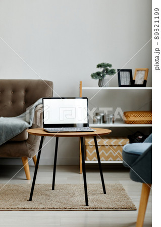 Laptop in Living Room Mockup Laptop in Living Room Mockup 89321199