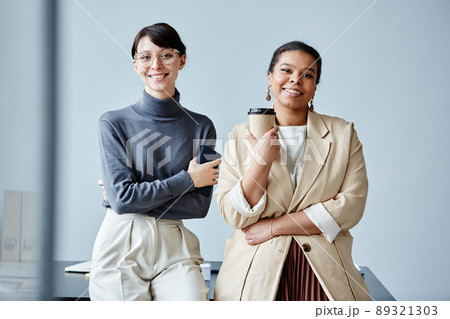 Female Business Team Candid 89321303