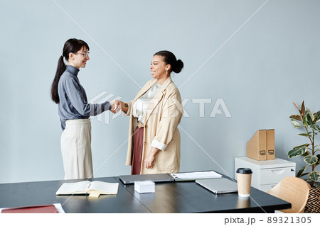 Two Business Women Greeting Minimal 89321305