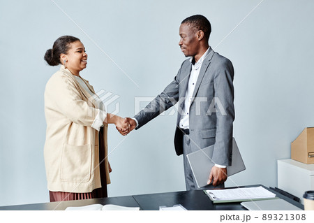 Two Business People Greeting Minimal 89321308