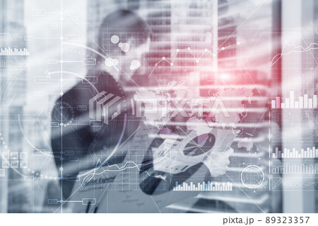 Financial dashboard with business intelligence BI. Blurred businessmen in the office Financial dashboard with business intelligence BI. Blurred businessmen in the office 89323357