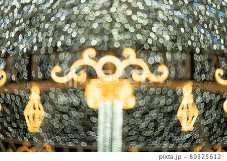 Christmas ilumination bokeh gights in the city Christmas ilumination bokeh gights in the city 89325612