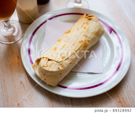 Turkish wrapped dish durum on white plate 89328992