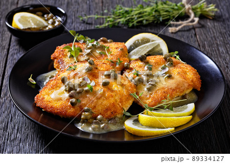 chicken piccata with lemon capers butter sauce chicken piccata with lemon capers butter sauce 89334127