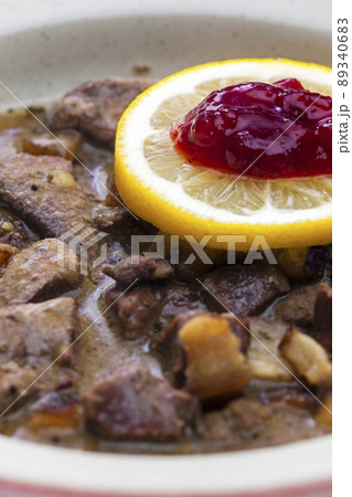 venison goulash with lemon and cranberries venison goulash with lemon and cranberries 89340683