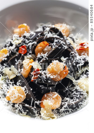 sepia tagliatelle with shrimps and parmesan cheese 89340684