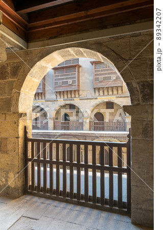 Arch with wooden balustrades, caravansary (Wikala) of Bazaraa, Cairo, Egypt 89342207