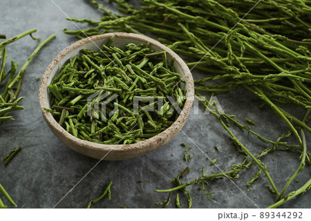 some cut wild asparagus in a ceramic bowl some cut wild asparagus in a ceramic bowl 89344292
