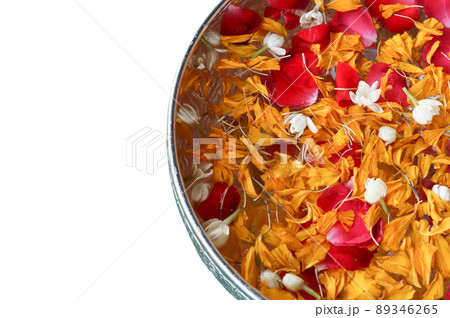 Flowers floating jasmine, marigold and rose for Songkran Festival on isolated background Flowers floating jasmine, marigold and rose for Songkran Festival on isolated background 89346265