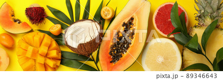 Exotic fruits set on yellow background, top view 89346643