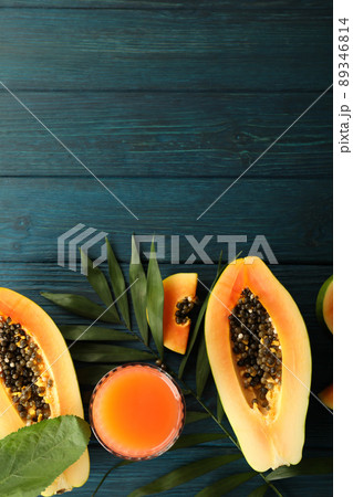 Fresh ripe papaya on wooden background, space for text Fresh ripe papaya on wooden background, space for text 89346814