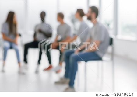background image of a group of young people sitting in a circle background image of a group of young people sitting in a circle 89349014