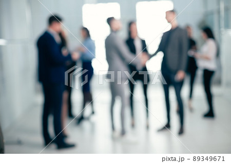 background image of a group of business people in the office lobby 89349671