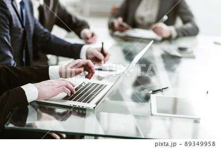 business team using a laptop is doing a marketing report on workplace business team using a laptop is doing a marketing report on workplace 89349958