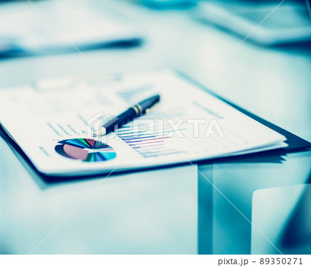 pen and financial documents on the table of the businessman pen and financial documents on the table of the businessman 89350271