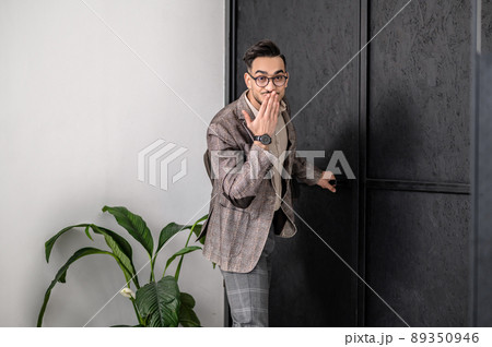 A good-looking young stylish man feeling good 89350946