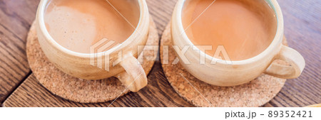 Homemade Indian Sweet masala tea. Spices - cardamom, cinnamon, ginger BANNER, LONG FORMAT 89352421