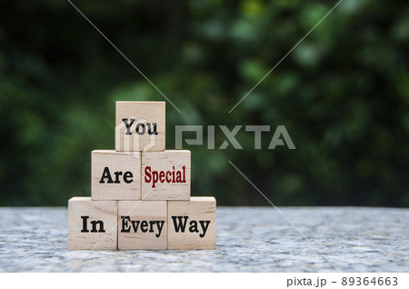 You are special in every way text on wooden blocks with blurred nature background. Motivational concept 89364663