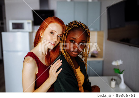 Two young lesbian girlfriends having fun at house 89366761