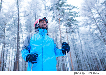 latin american young skier man forest winter day in New Year holidays Christmas latin american young skier man forest winter day in New Year holidays Christmas 89366762