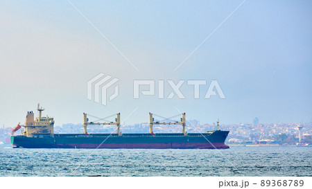 An bulk carrier or bulker sails in the sea to trade around the world 89368789