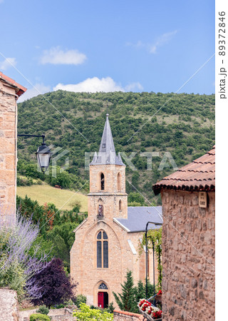 Church of St. Christopher, part of medieval building with masonry and roof on entrance of Peyre Church of St. Christopher, part of medieval building with masonry and roof on entrance of Peyre 89372846