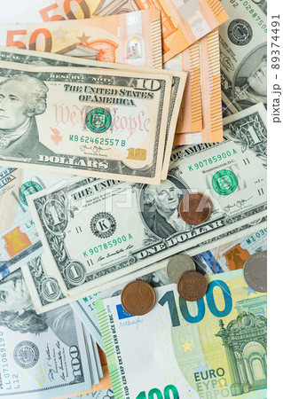 Multicurrency banknotes, coins. The concept of the world economy during the crisis. Money rules in world events, the stock exchange and the trade link between countries. 89374491