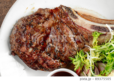 Closeup on juicy grilled beef steak texture 89375505