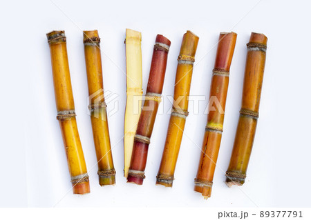 Sugar cane on white background. Sugar cane on white background. 89377791