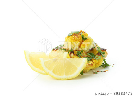 Tasty baked cauliflower isolated on white background Tasty baked cauliflower isolated on white background 89383475