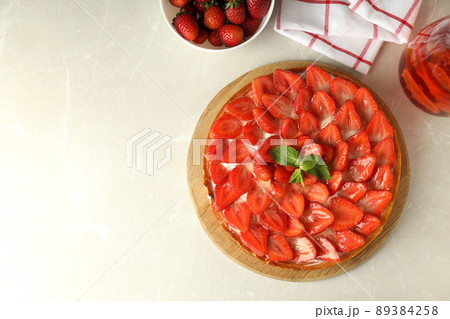 Concept of tasty food with strawberry tart, top view Concept of tasty food with strawberry tart, top view 89384258