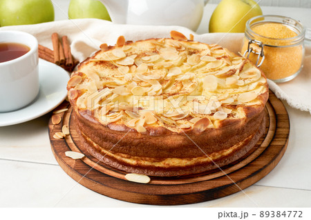 Cheesecake, apple pie, curd dessert with polenta, apples, almond flakes Cheesecake, apple pie, curd dessert with polenta, apples, almond flakes 89384772