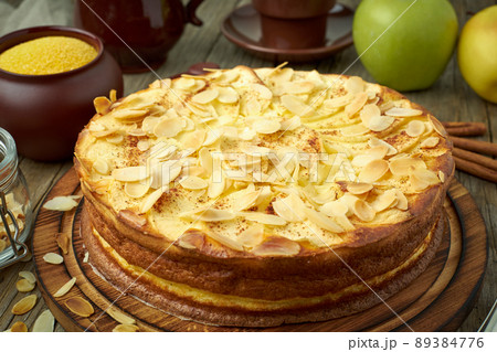 Cheesecake, apple pie, curd dessert with polenta, apples, almond flakes 89384776