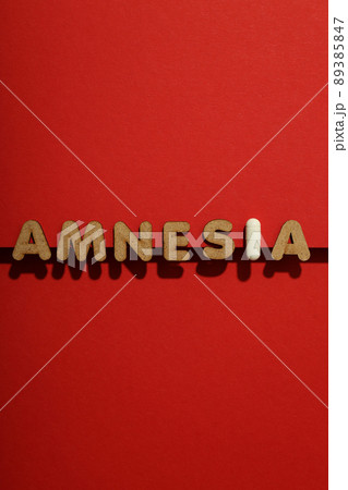 Concept of problems with memory, amnesia disease on red background 89385847