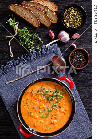 roast sweet potato and carrot soup with green peas roast sweet potato and carrot soup with green peas 89386813