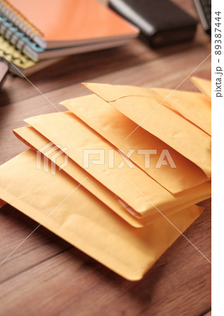 yellow paper bubble envelope on table yellow paper bubble envelope on table 89387444