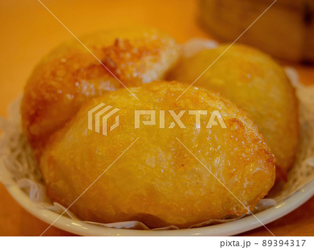 Close up shot of sweet deep fried dumpling Close up shot of sweet deep fried dumpling 89394317