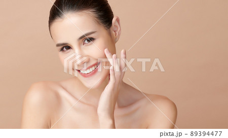 Beautiful young asian woman with clean fresh skin on beige background, Face care, Facial treatment, 89394477