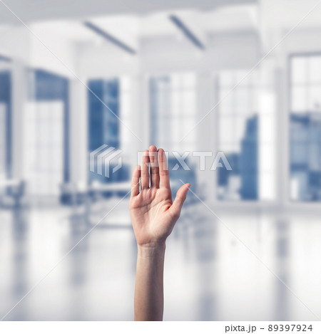 Choosing gesture of person in elegant modern interior in sunshine light 89397924