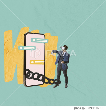 Contemporary art collage. Man in VR glasses in front of giant phone screen connected with chain, texting, communicating Contemporary art collage. Man in VR glasses in front of giant phone screen connected with chain, texting, communicating 89410208