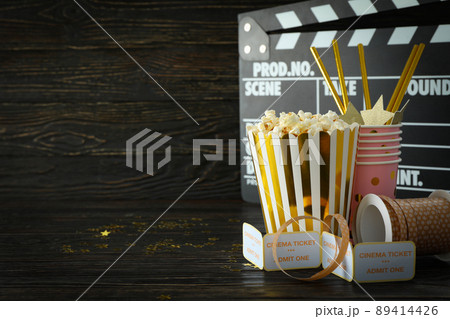 Concept of cinema accessories on wooden background Concept of cinema accessories on wooden background 89414426
