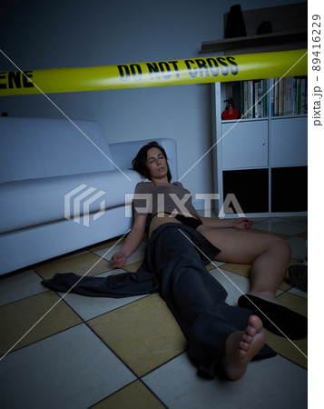 Crime Scene - Woman dead lying on the floor 89416229
