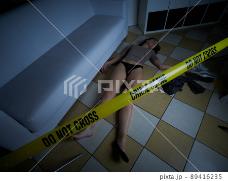 Crime Scene - Woman dead lying on the floor 89416235
