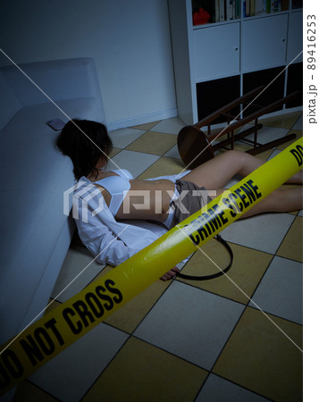 Crime Scene - Woman dead lying on the floor Crime Scene - Woman dead lying on the floor 89416253