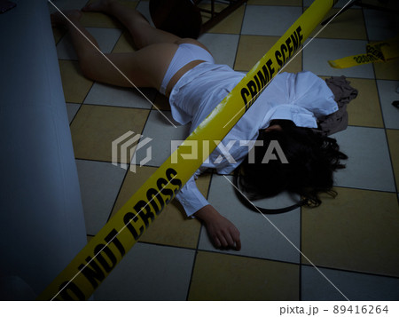 Crime Scene - Woman dead lying on the floor 89416264