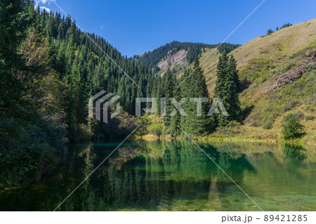 Kaindy lake - mountain lake in Kazakhstan 89421285
