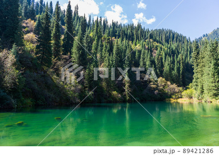 Kaindy lake - mountain lake in Kazakhstan Kaindy lake - mountain lake in Kazakhstan 89421286