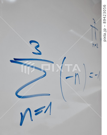 mathematical symbols of an equation from a mathematics lecture on a white board mathematical symbols of an equation from a mathematics lecture on a white board 89423056