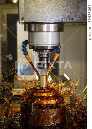 The vertical scene CNC milling machine cutting the shell mold parts with oil coolant method. The vertical scene CNC milling machine cutting the shell mold parts with oil coolant method. 89423065